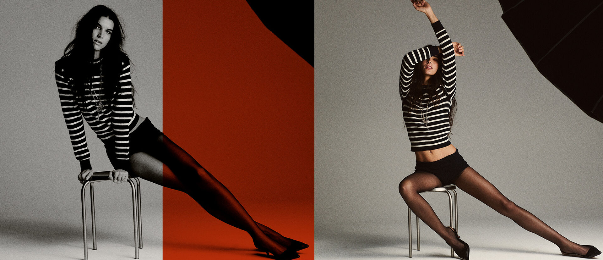 A brunette model sitting on a stool wearing tights, black high heels and a striped knitted jumper. 